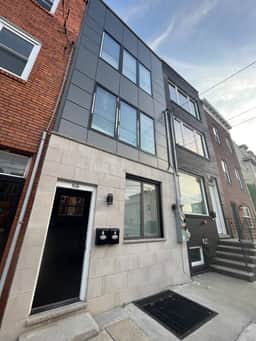 2 bedroom with back yard walk to city.