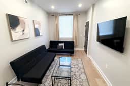 2 bedroom with back yard walk to city.
