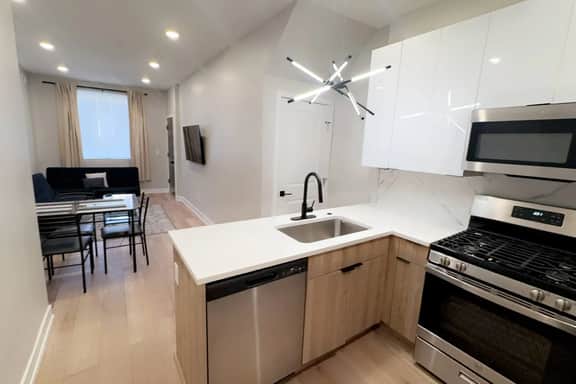 2 bedroom with back yard walk to city.