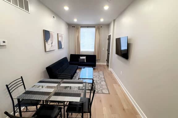 2 bedroom with back yard walk to city.
