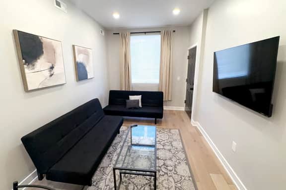 2 bedroom with back yard walk to city.