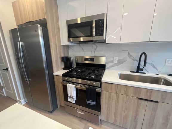 4 bed bi-level with roof deck. In the city.