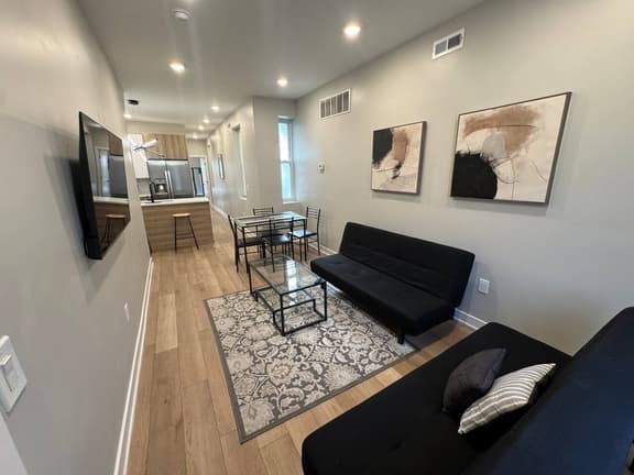 2 bedroom with back yard walk to city.
