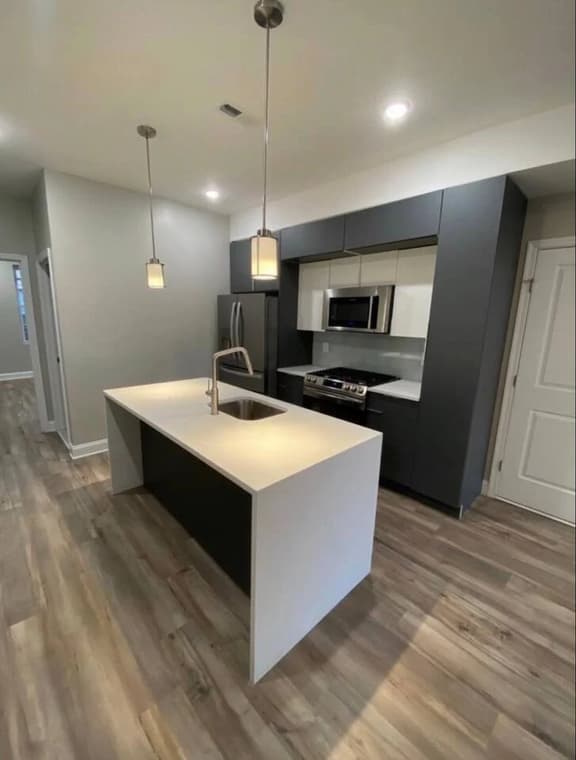 New three bedroom art museum area with backyard